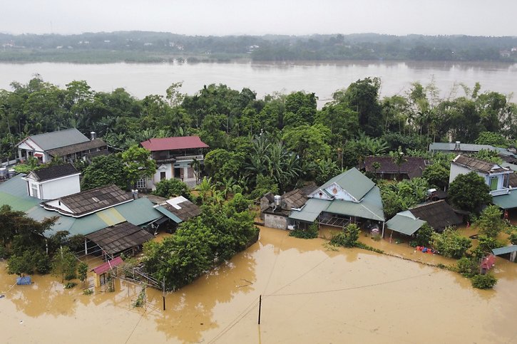 Maisons submergées par les inondations dans la province vietnamienne de Phu Tho. © KEYSTONE/AP/Ta Van Toan